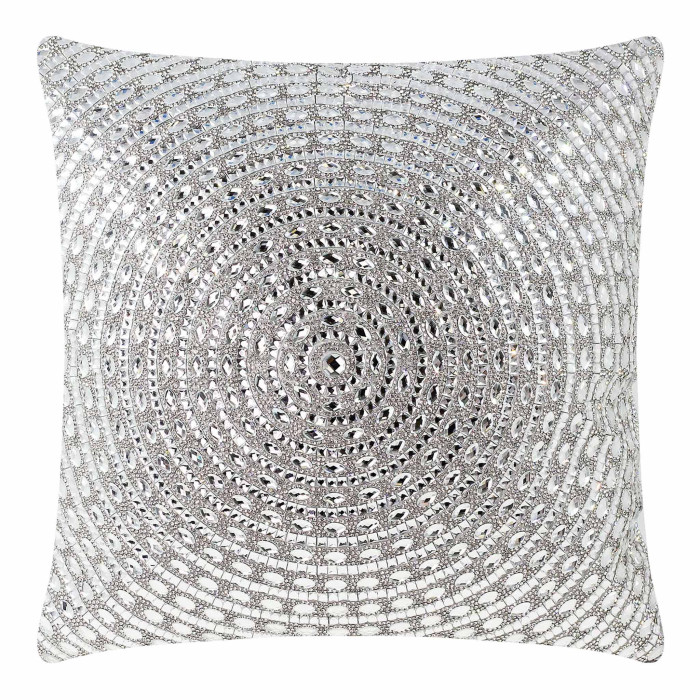 Square pillow covered in silver velvet with circular patterns of large glass rhinestones arranged in concentric circles.