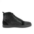 Red high-top sneakers made of leather and suede adorned with glass rhinestones featuring a smooth texture and rubber sole. Red high-top sneakers made of leather and suede adorned with glass rhinestones featuring a smooth texture and rubber sole.