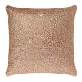Square pillow covered in shimmering silver rhinestones on a soft velvet texture.