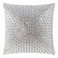 Square pillow covered in silver velvet with circular patterns of large glass rhinestones arranged in concentric circles. Square pillow covered in silver velvet with circular patterns of large glass rhinestones arranged in concentric circles.