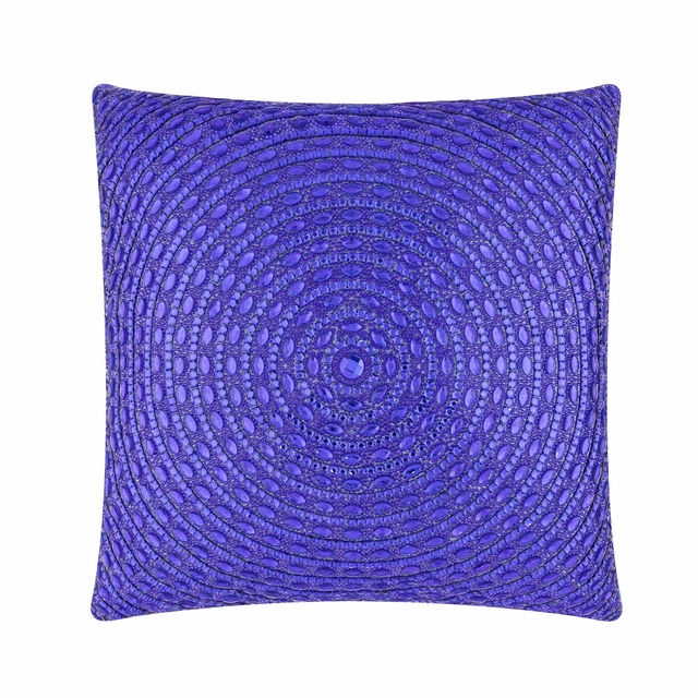 Square pillow covered in silver velvet with circular patterns of large glass rhinestones arranged in concentric circles.