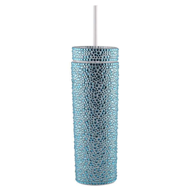 A tall silver tumbler covered in rhinestones with a clear straw and a smooth shiny surface. A tall silver tumbler covered in rhinestones with a clear straw and a smooth shiny surface.
