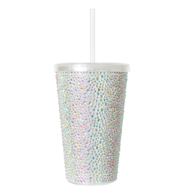 A pink acrylic tumbler covered in rhinestones featuring a silver lid and straw with a textured sparkling surface.