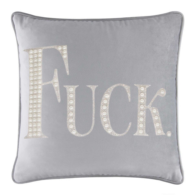 White velvet pillow with large rhinestone and faux pearl lettering spelling "FUCK" in silver embellishments. White velvet pillow with large rhinestone and faux pearl lettering spelling "FUCK" in silver embellishments.