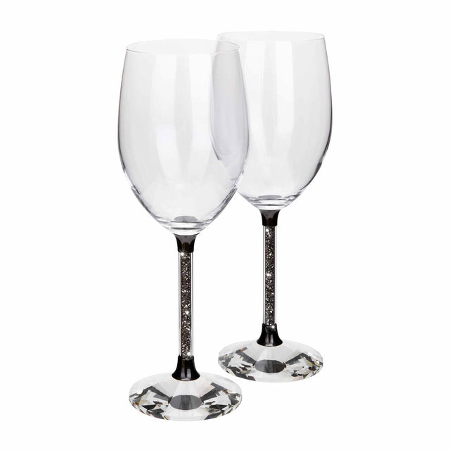 Clear crystal wine glass with a gold stem featuring yellow rhinestones and a faceted clear base. Clear crystal wine glass with a gold stem featuring yellow rhinestones and a faceted clear base.