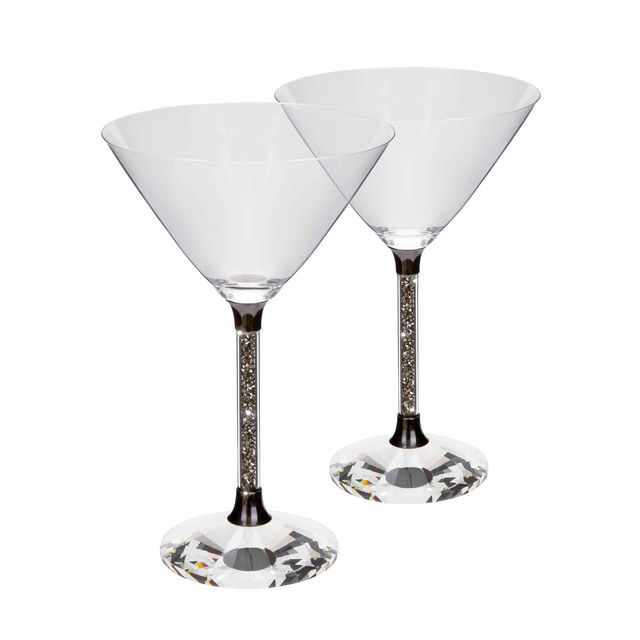 Clear crystal martini glass with a wide conical bowl a faceted base and a stem featuring embedded rhinestones. Clear crystal martini glass with a wide conical bowl a faceted base and a stem featuring embedded rhinestones.
