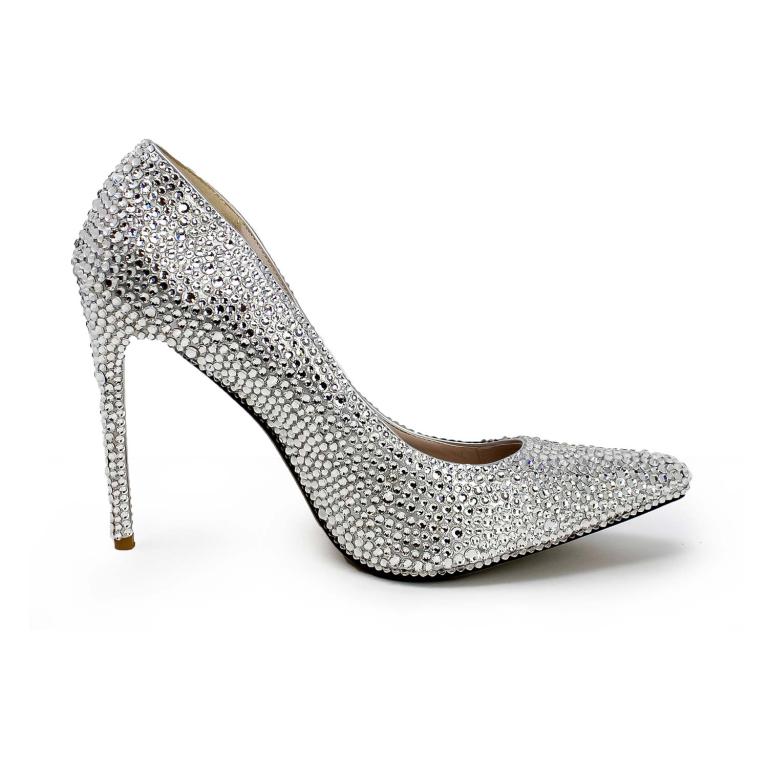 Silver high-heeled pump covered in shimmering glass rhinestones with a pointed toe and rubberized sole.
