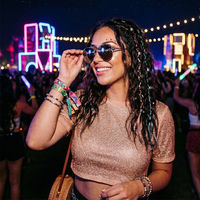 Serving festival sparkle. ✨⁠ ⁠ A rhinestoned bomber jacket, crop top, and heels made for dancing from day to night.⁠ ⁠ #FestivalSeason #CoachellaStyle #RhinestoneFashion #SparkleOutfit